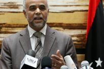 Mohammed al-Harizy, a spokesman for the Libyan National Transitional Council (NTC), speaks at a news conference in Tripoli February 11, 2012.