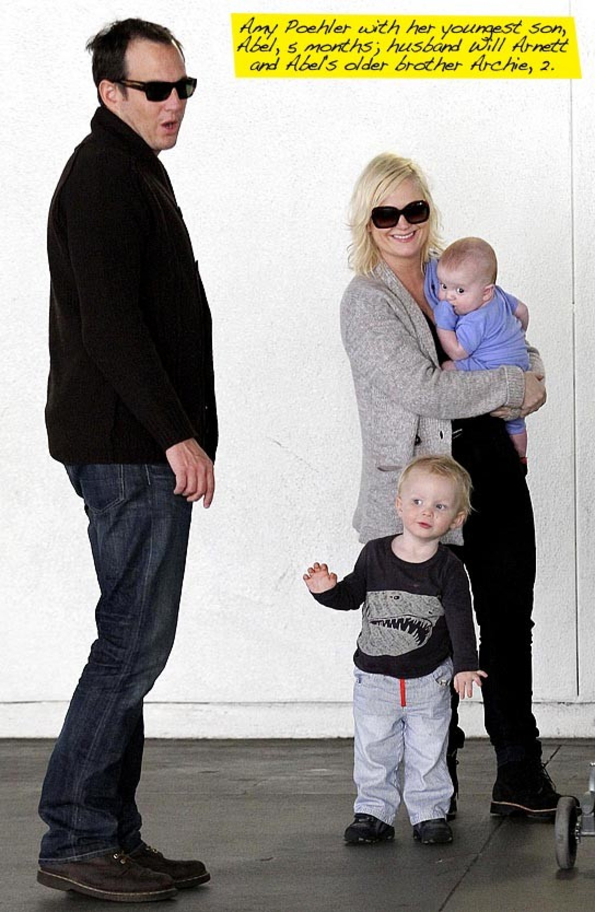 Amy Poehler and Kevin Arnett with their boys.