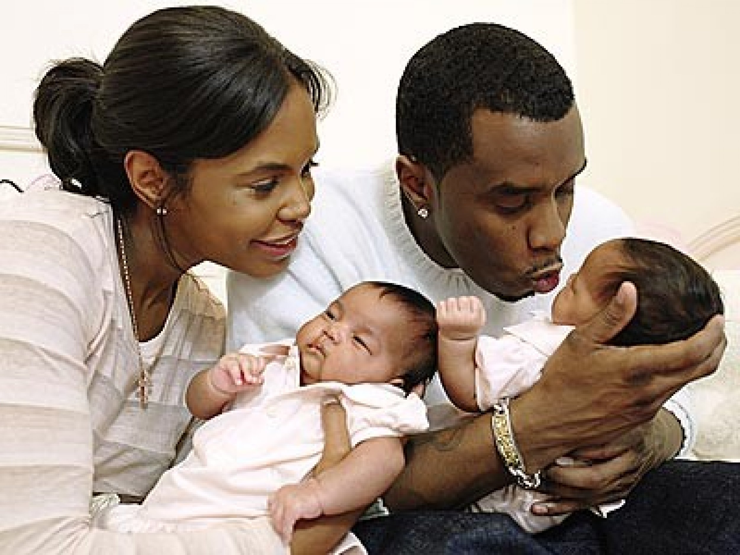 Sean P. Diddy Combs with girlfriend Kimberly Porter and their twin babies.