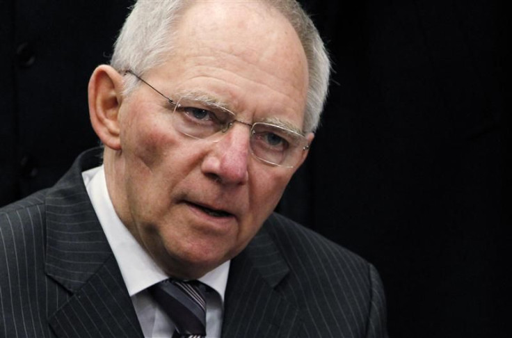 Germany&#039;s Finance Minister Schaeuble talks to the media as he arrives at an EU finance ministers meeting in Brussels