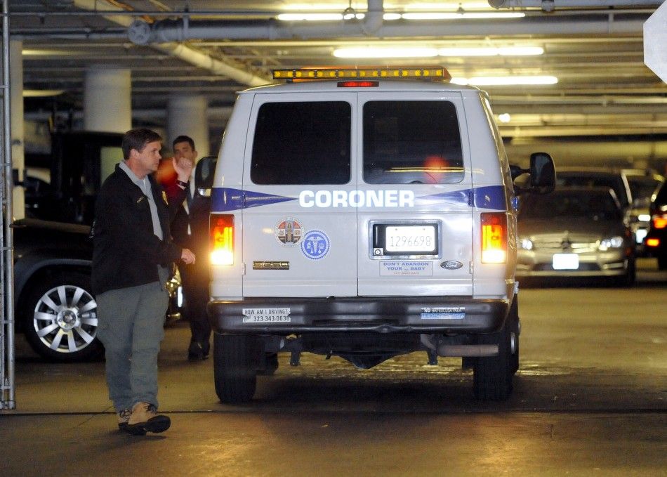 A Los Angeles County Coroners van is moved into place to collect the body of singer Whitney Houston, after she was found dead in her Beverly Hilton hotel room, in Beverly Hills