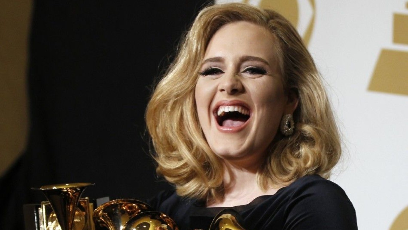 Grammys 2012: Adele Makes a Clean Sweep on Somber Night – Billboard