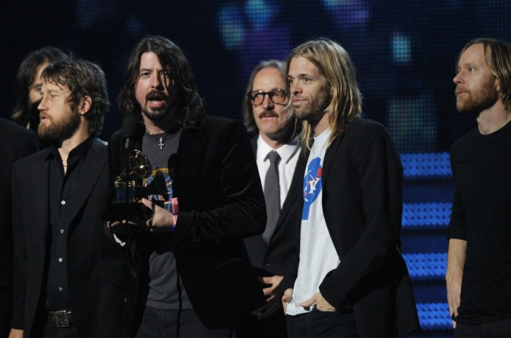 The band Foo Fighters accept the award for best rock performance at the 54th annual Grammy Awards in Los Angeles, California