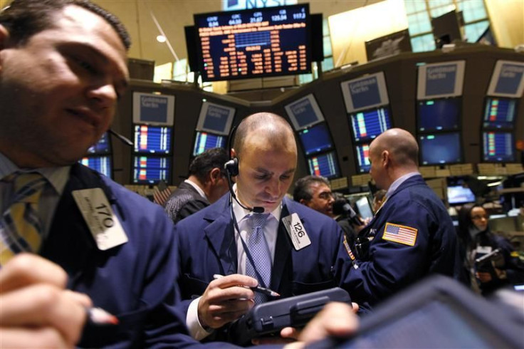 Traders work on the floor of the New York Stock Exchange